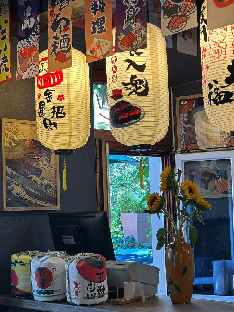 Lanterns, sake barrels and sunflowers at the counter
